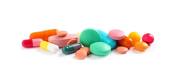 Stapel Van Verschillende Kleurrijke Pillen Witte Achtergrond — Stockfoto
