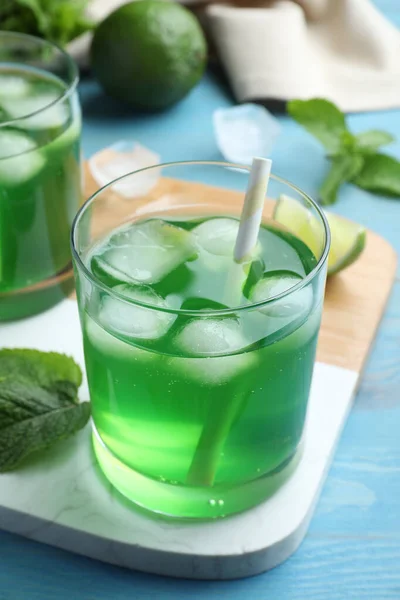 Delicious Mint Liqueur Green Leaves Ice Cubes Turquoise Wooden Table — Stock Photo, Image