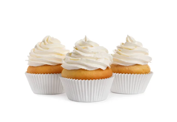 Deliciosos Cupcakes Decorados Con Crema Sobre Fondo Blanco — Foto de Stock