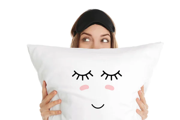 白い背景に可愛い顔をした枕を持つ女 — ストック写真