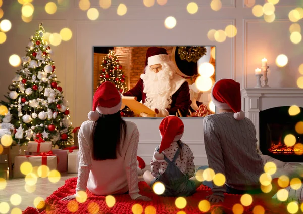Family Watching Movie Room Decorated Christmas Back View — Stock Photo, Image