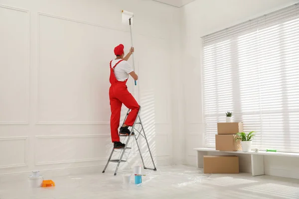 Worker Painting Wall Roller Ladder Indoors — Stock Photo, Image