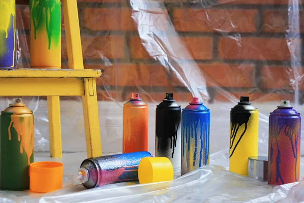 Used Cans Spray Paints Brick Wall Indoors Graffiti Supplies — Stock Photo, Image