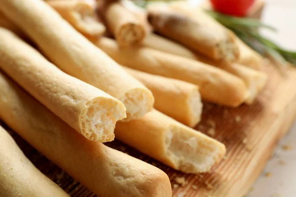 Delicious Grissini Sticks Wooden Board Closeup — Stock Photo, Image