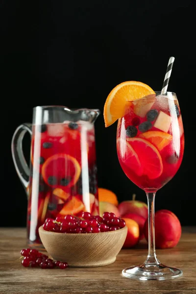 Glass Jug Red Sangria Fruits Wooden Table Black Background — Stock Photo, Image