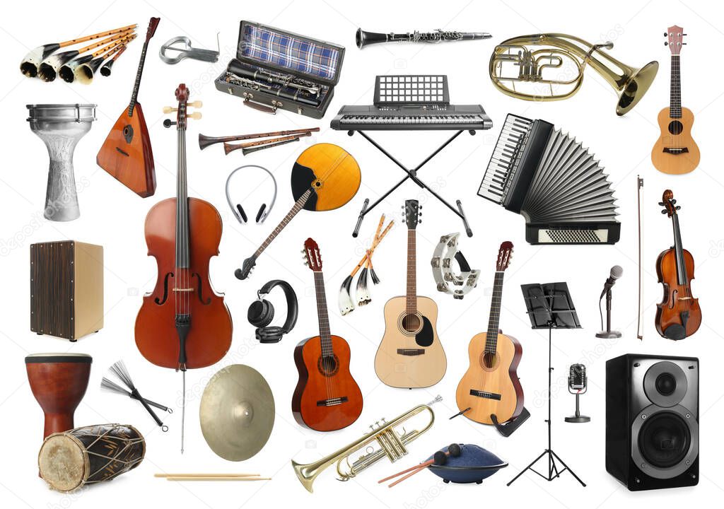 Collection of different musical instruments on white background