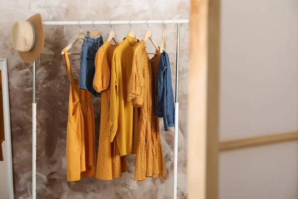 Different Stylish Clothes Hanging Rack Room — Stock Photo, Image