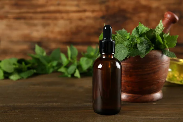 Glass Bottle Nettle Oil Dropper Leaves Wooden Table Space Text — Stock Photo, Image