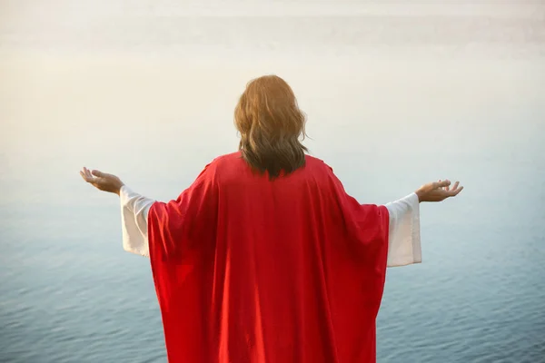 Jesus Cristo Perto Água Livre Vista Traseira — Fotografia de Stock