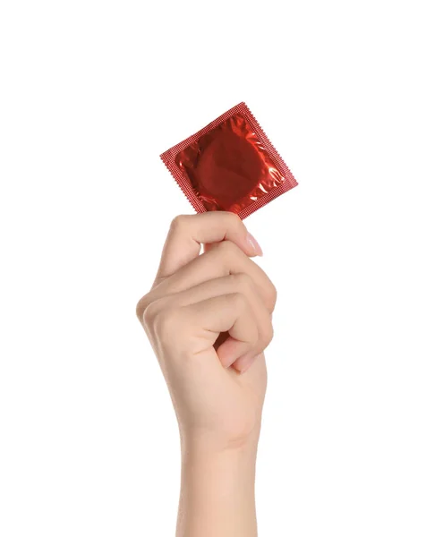 Kvinna Innehar Kondom Vit Bakgrund Närbild — Stockfoto