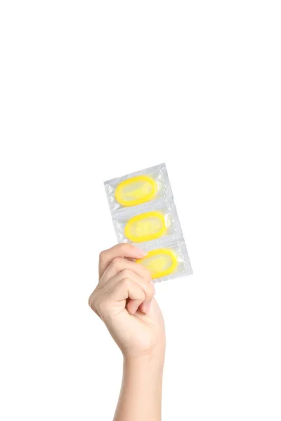 Woman Holding Condoms White Background Closeup — Stock Photo, Image