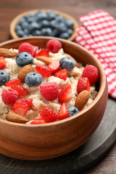 Tasty Oatmeal Porridge Berries Almond Nuts Bowl Served Table Closeup — Stock Photo, Image