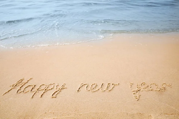 Sandy Beach Text Happy New Year Washed Sea — Stock Photo, Image
