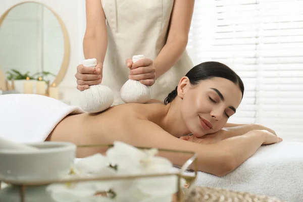 Young Woman Receiving Herbal Bag Massage Spa Salon — Stock Photo, Image