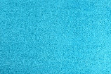 Arka plan olarak temiz açık mavi plaj havlusu, yakın plan