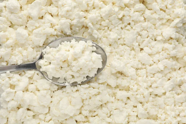 Delicious Fresh Cottage Cheese Spoon Background Top View — Stock Photo, Image