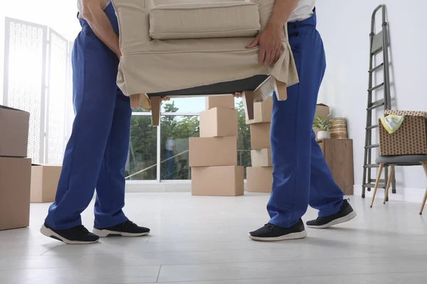 Moving Service Employees Carrying Armchair Room Closeup — Stock Photo, Image
