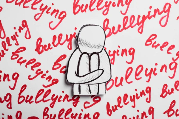 Criança Figura Papel Palavras Bullying Escrito Fundo Branco Vista Superior — Fotografia de Stock