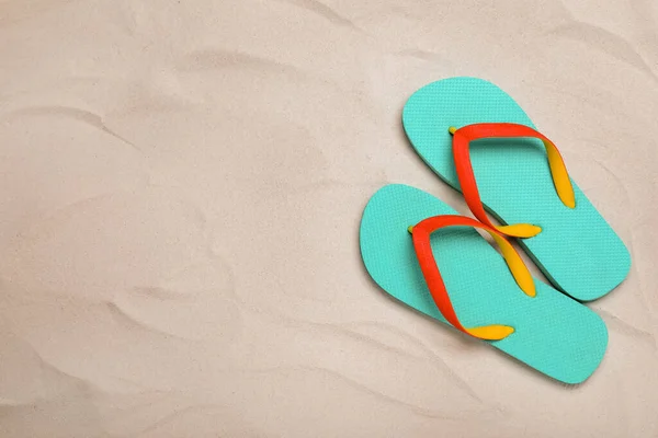 Pair Turquoise Flip Flops Sand Flat Lay Space Text — Stock Photo, Image