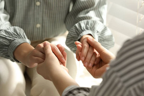 Religious Women Holding Hands Praying Together Window Indoors Closeup — Stock Photo, Image