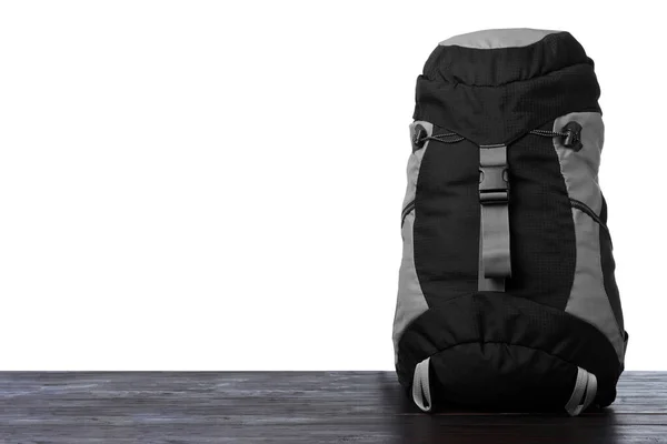 Wanderrucksack Auf Hölzerner Oberfläche Vor Weißem Hintergrund Raum Für Text — Stockfoto