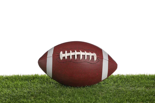白い背景を背景に芝生の上で革アメリカンフットボール — ストック写真