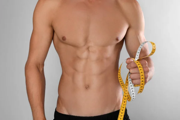 Shirtless Man Slim Body Measuring Tape Grey Background Closeup — Stock Photo, Image