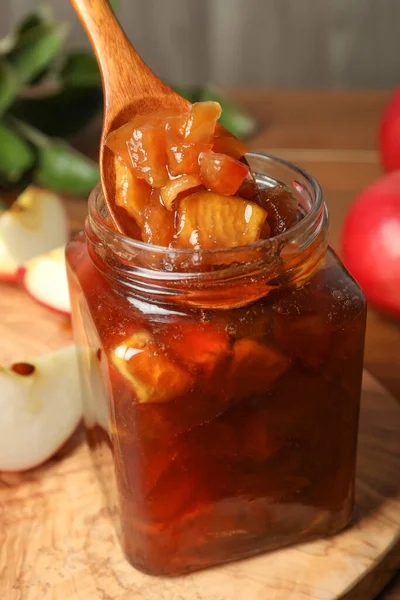 Spoon Tasty Apple Jam Glass Jar Wooden Board Closeup — Stock Photo, Image