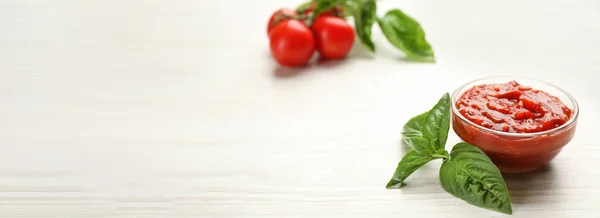 Delicious Adjika Sauce Glass Bowl Basil White Wooden Table Space — Stock Photo, Image