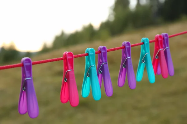 Colorful Clothespins Hanging Washing Line Outdoors — Stock Photo, Image