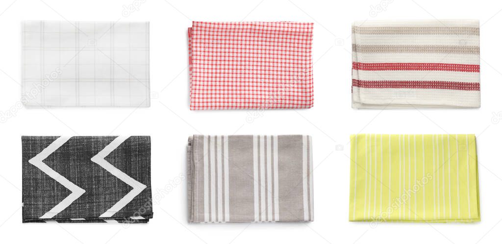 Set with different clean kitchen towels on white background, top view. Banner design