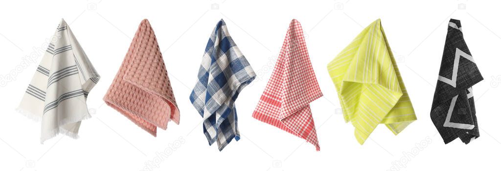 Set with different clean kitchen towels on white background. Banner design