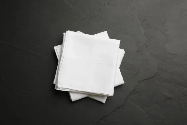 White Handkerchiefs Folded Black Table Top View — Stock Photo, Image