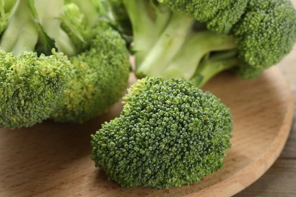 Fresh raw broccoli on table , closeup view