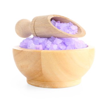 Violet sea salt in bowl and scoop isolated on white