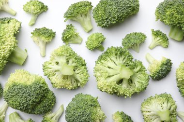 Fresh green broccoli on white background, top view