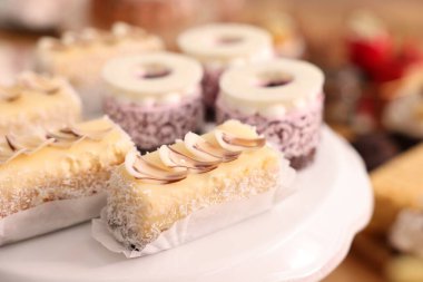 Buffet menu. Different delicious desserts on table, selective focus