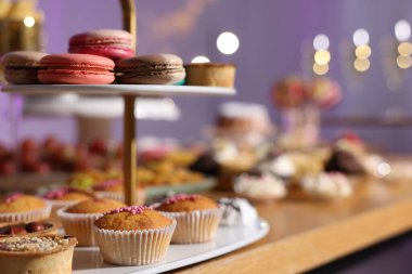 Buffet menu. Different delicious desserts on table, selective focus