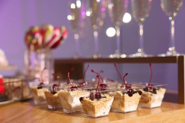 Buffet menu. Delicious desserts and drinks on table, selective focus