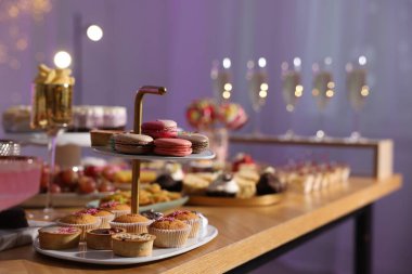 Buffet menu. Different delicious desserts on table, selective focus