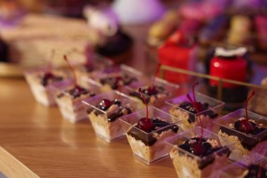 Buffet menu. Different delicious desserts on table, selective focus