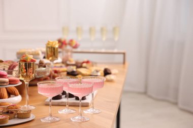 Buffet menu. Delicious desserts and drinks on table, selective focus. Space for text