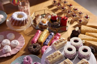 Buffet menu. Delicious desserts on table, closeup