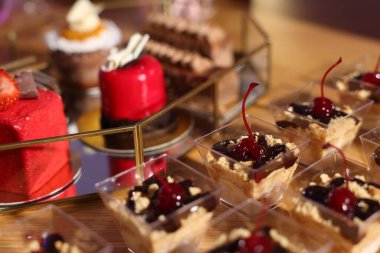 Buffet menu. Different delicious desserts on table, selective focus