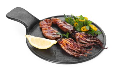 Tasty cooked squids with lemon and salad isolated on white