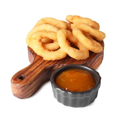 Tasty fried squid rings and sauce isolated on white