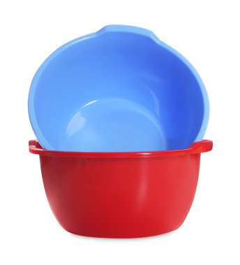Two colorful plastic basins isolated on white