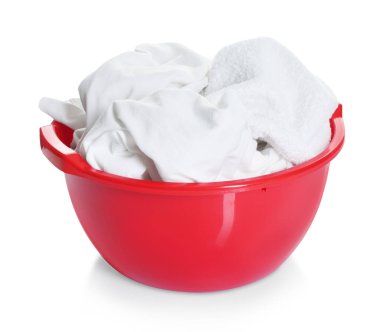 Plastic basin with laundry isolated on white