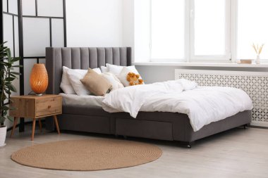 Beautiful room with comfortable bed. Interior design