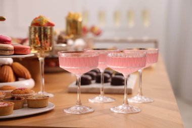 Buffet menu. Delicious desserts and drinks on table, selective focus